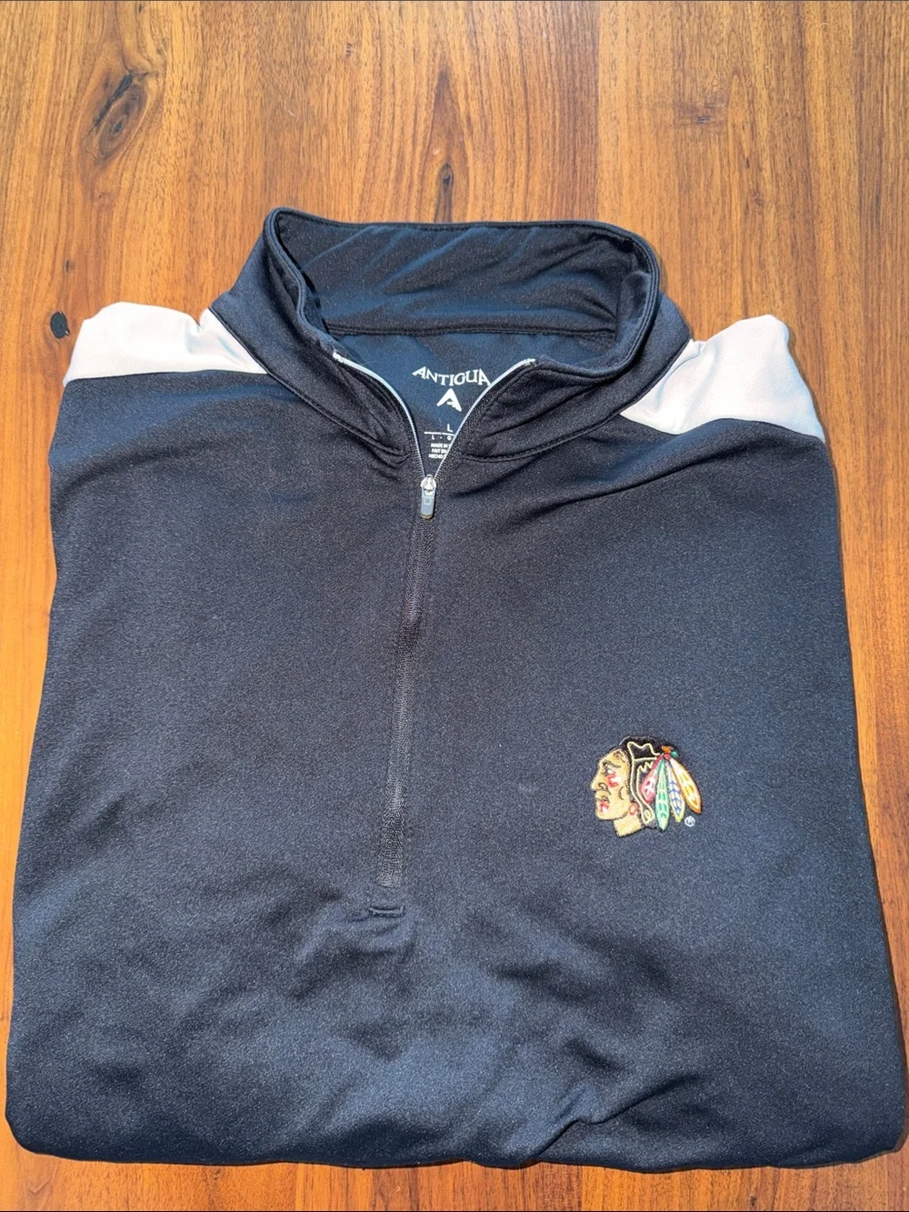 Antigua Black Quarter-Zip Pullover with Gray Shoulder Accents and Team Crest